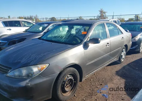 2003 Toyota Camry Le z USA, uszkodzony, nr VIN 4T1BE32K23U782482